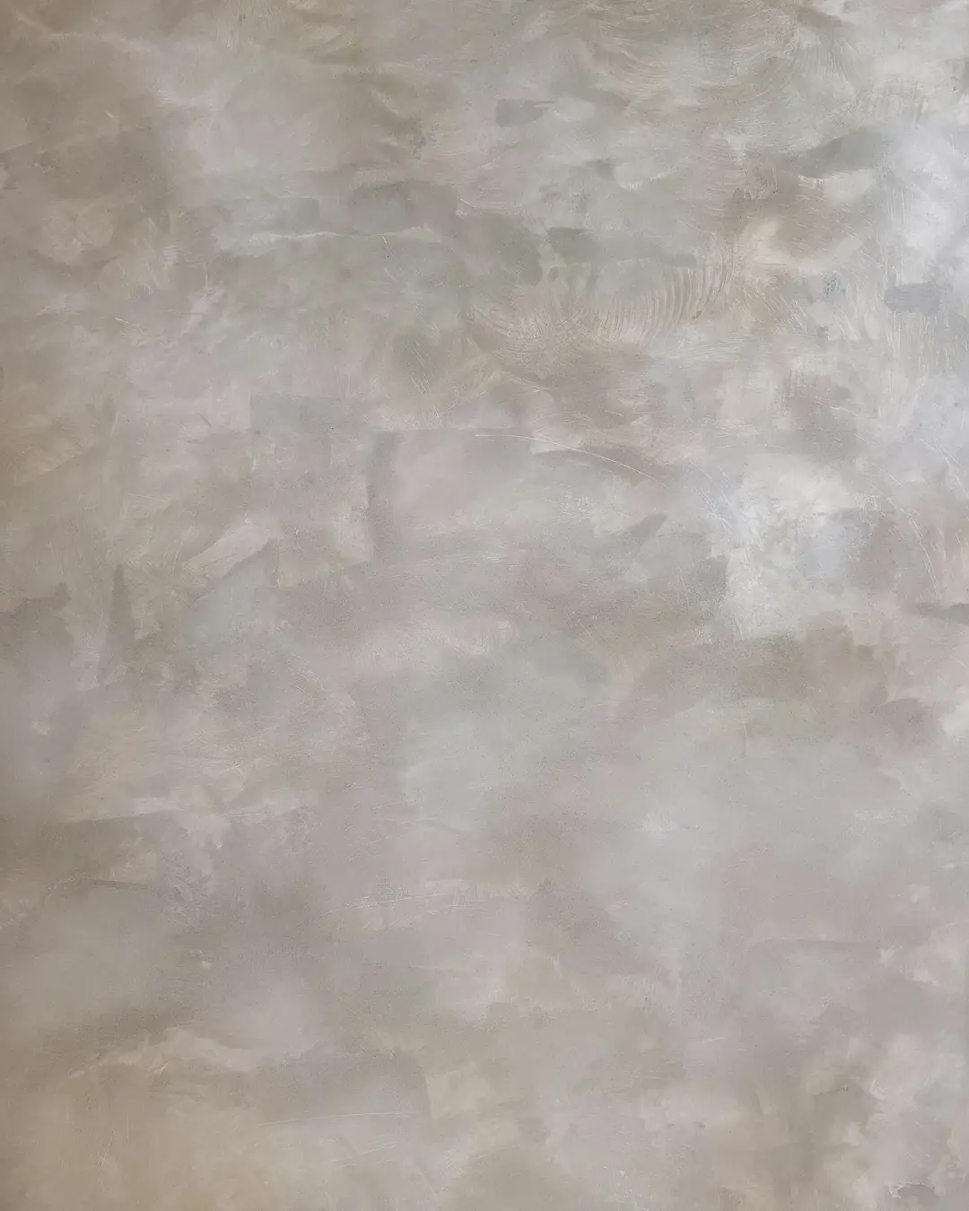 Parete con effetto spatolato grigio chiaro